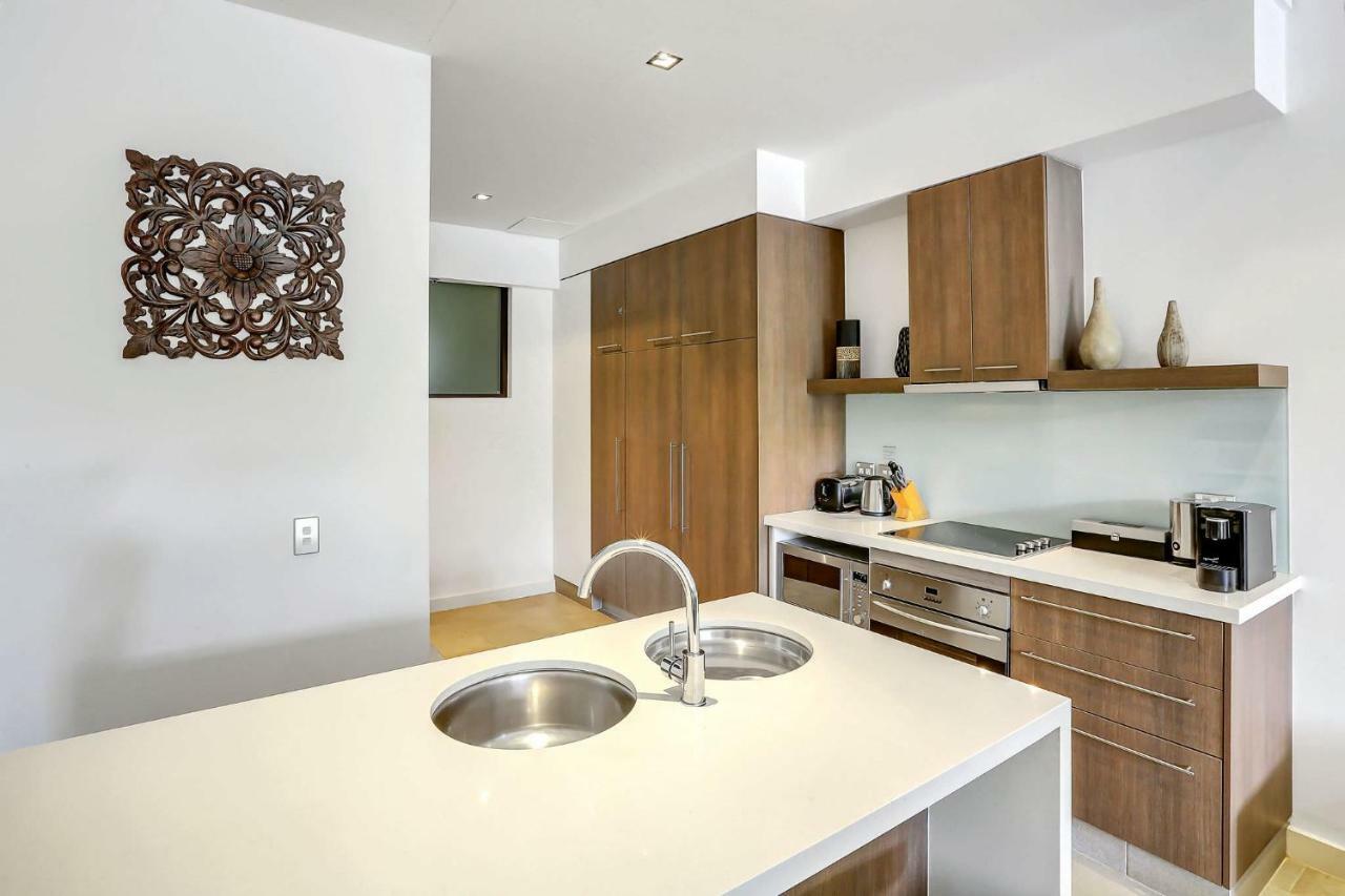 Elysium Private Apartments Triton By The Sea Palm Cove Extérieur photo